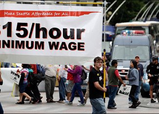 Seattle council has voted unanimously to raise the city's minimum wage to $15