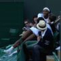 Serena Williams falls into spectator’s lap at Wimbledon 2014