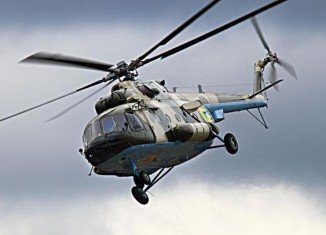 Ukraine’s Mi-8 helicopter, used for transporting military cargo, was hit by a rocket shortly after take-off outside the rebel-held city of Sloviansk