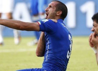 Uruguay's striker Luis Suarez appeared to bite Italy's Giorgio Chiellini during their Group D clash at the World Cup tournament in Brazil
