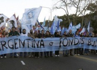 Argentina can't afford to pay the so-called hold-out creditors and risks a new bond default