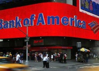 Bank of America has reported a 43 percent drop in its quarterly profits after a fall in mortgage revenue and a rise in legal costs