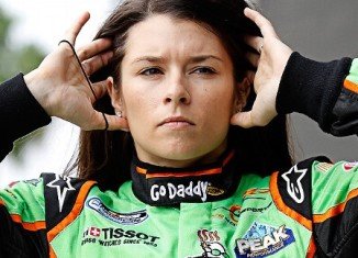 Danica Patrick admitted she just can't resist digging into her pocketbook when it comes to the clothing needs of her new niece