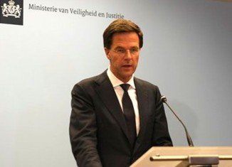 Dutch PM Mark Rutte says sending out an international military force to secure the site of the downed Malaysian Airlines jet in eastern Ukraine is unrealistic