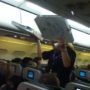 Frontier Airlines pilot Gerhard Brandner orders pizza for a plane full of passengers