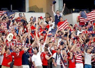 Millions of soccer fans in America have stopped work early to watch team USA playing Belgium for a place in the World Cup quarter-finals in Brazil