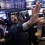 Dow Jones Industrial Average tops 17,000 for first time