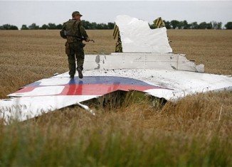 The downing of the Malaysia Airlines plane in Ukraine may be considered a war crime