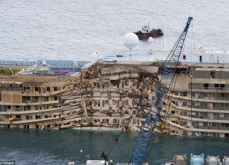 The wrecked Costa Concordia cruise ship is being towed on its final journey to the port of Genoa for scrapping