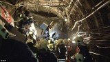 Two Moscow metro workers have been arrested for safety breaches after a train derailed, killing 21 people