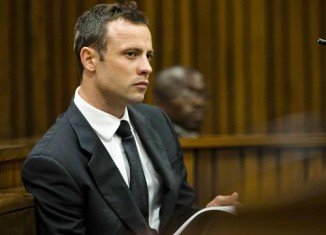 Oscar Pistorius denies prosecution claims that he deliberately shot Reeva Steenkamp