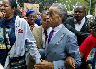 The Staten Island march was led by the Rev. Al Sharpton and relatives of Eric Garner