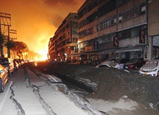 The blasts rocked the city's Cianjhen district, scattering cars and blowing deep trenches in roads