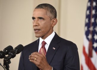 Barack Obama has announced that the US will not hesitate to take action against Islamic State militants in Syria as well as Iraq