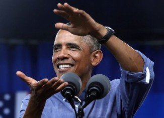 Barack Obama has said he will continue to press Congress to raise the federal minimum wage as the US rebounds from recession