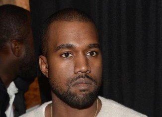 Kanye West stopped his concert at the Qantas Credit Union Arena in Sydney and repeatedly asked a wheelchair-user to stand up