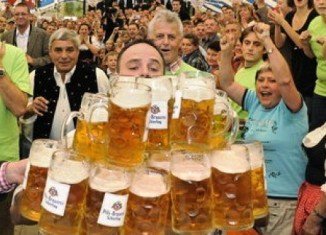 Oliver Struempfel set a new world record in beer-mug-carrying at the Gillemoos festival in Abensberg