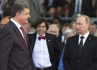 Petro Poroshenko has agreed with Vladimir Putin by phone on a cease-fire process for eastern Ukraine