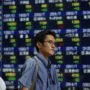 Asian markets open lower as Wall Street tumbles on US economic data