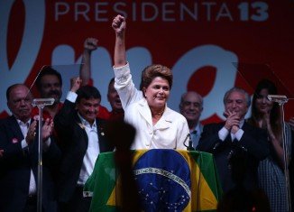Brazil’s President Dilma Rousseff has been re-elected for a second term after securing more than 51 percent of votes in the closest election race in many years