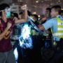 Hong Kong police to investigate violence against handcuffed protesters