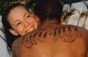 Nick Cannon got his Mariah Carey's first name inked across his shoulders in large letters shortly before they tied the knot in 2008