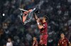 The Euro 2016 qualifier between Serbia and Albania was abandoned after a drone carrying a political message sparked clashes involving players and fans on the Partizan Stadium pitch