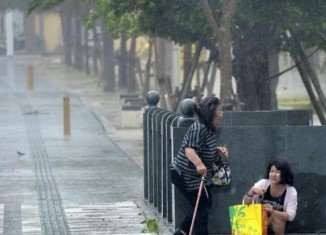 Typhoon Phanfone is bringing many parts of Japan to a standstill with heavy wind and rain as it heads towards Tokyo
