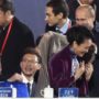 Vladimir Putin drapes China’s First Lady Peng Liyuan in shawl at APEC event