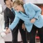 Angela Merkel meets ASIMO at Tokyo museum