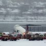 New York snow: Delta plane skids off La Guardia airport runway