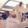 Pope Francis gets pizza delivered to popemobile in Naples