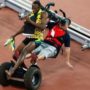 Usain Bolt Knocked Down by Segway-Riding Cameraman in Beijing