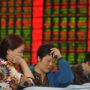 China Stock Markets Volatile After Four-Day Weekend