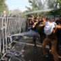 Refugee Crisis: Hungary Police Use Tear Gas and Water Cannon at Serbian Border