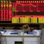Asian Markets Trade Lower on ECB Policy-Easing Moves