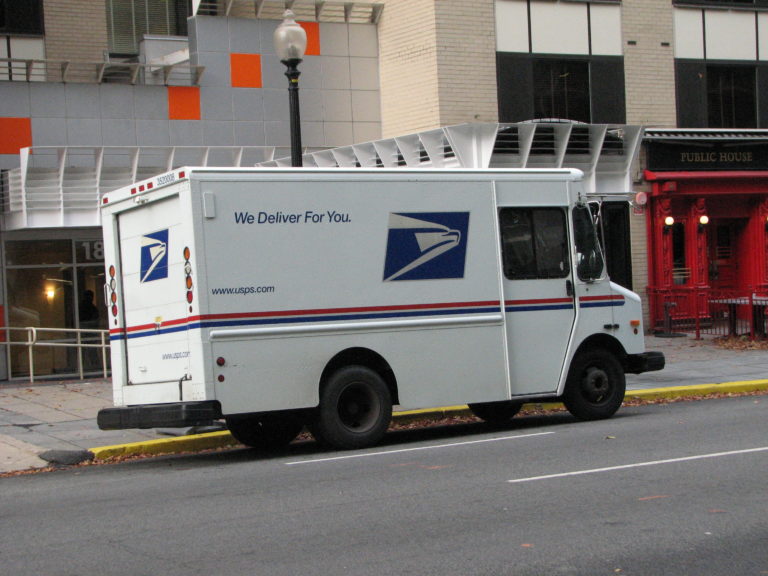 USPS Suspends Policy Changes Amid Postal Voting Controversy