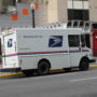 USPS Suspends Policy Changes Amid Postal Voting Controversy