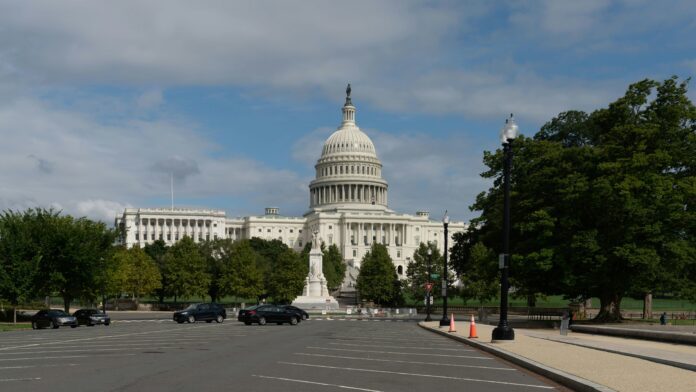 white concrete building under blue sky during daytime