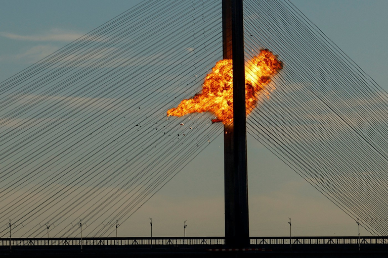 Russia Strikes Key Kyiv Bridge as German Chancellor Makes Surprise Visit